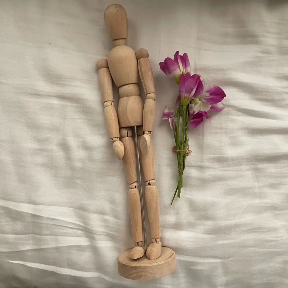 ikea gestalta artist’s wooden figure with flowers